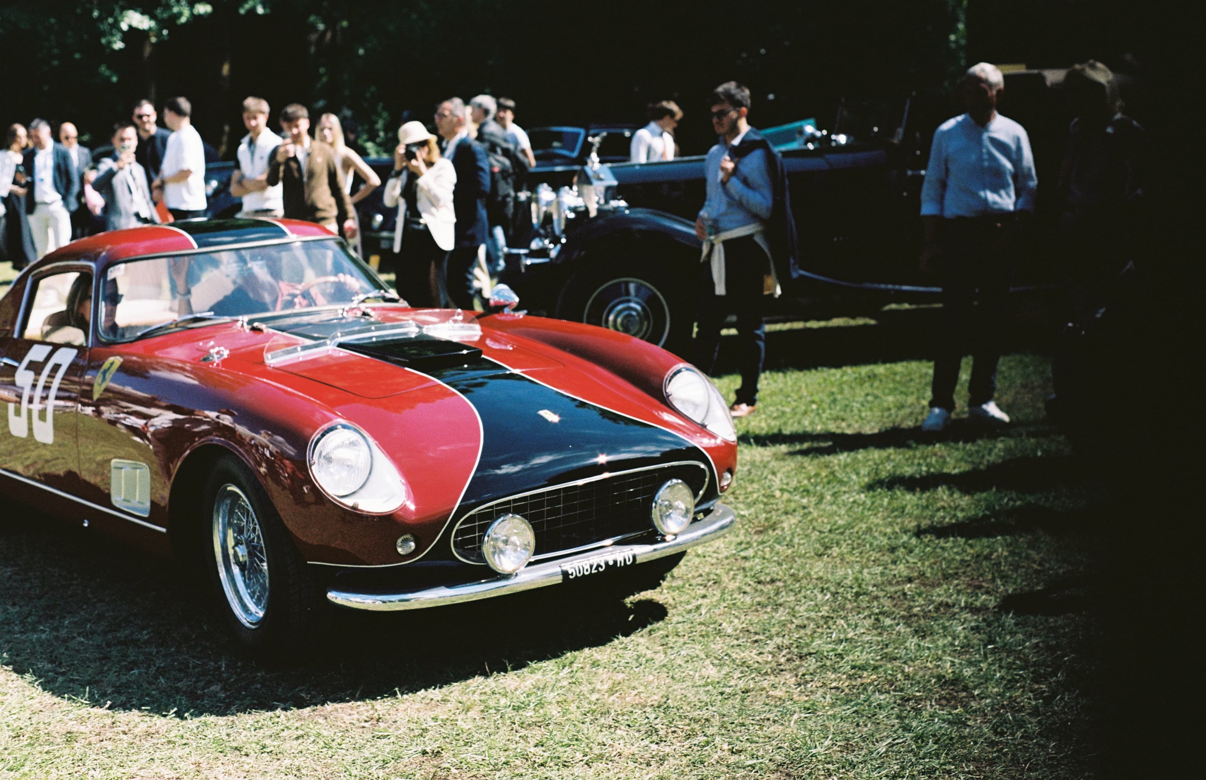 Red classic Ferrari at a curated automotive gathering